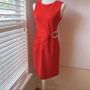Woman’s Coral dress sunburst pleated gold buckle